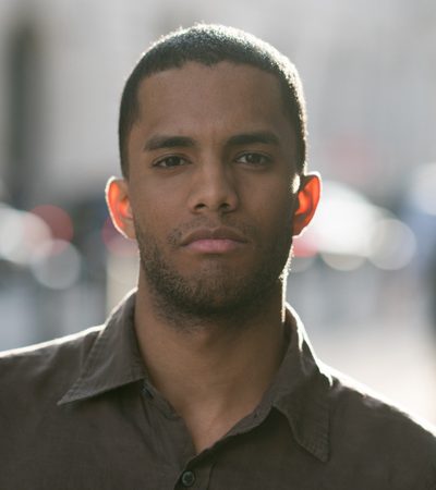 Portrait of casual man looking at the camera on the streets of London - lifestyle concepts